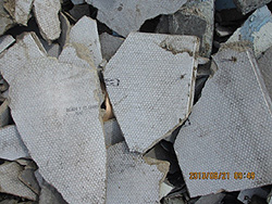 写真1　災害廃棄物中の石綿含有建材